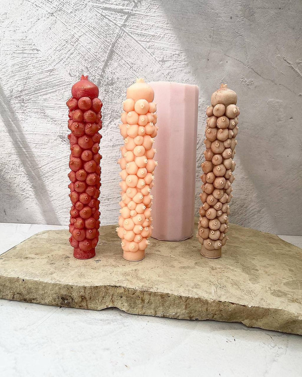 candle with pomegranate design