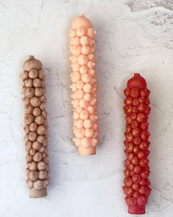 candle with pomegranate design